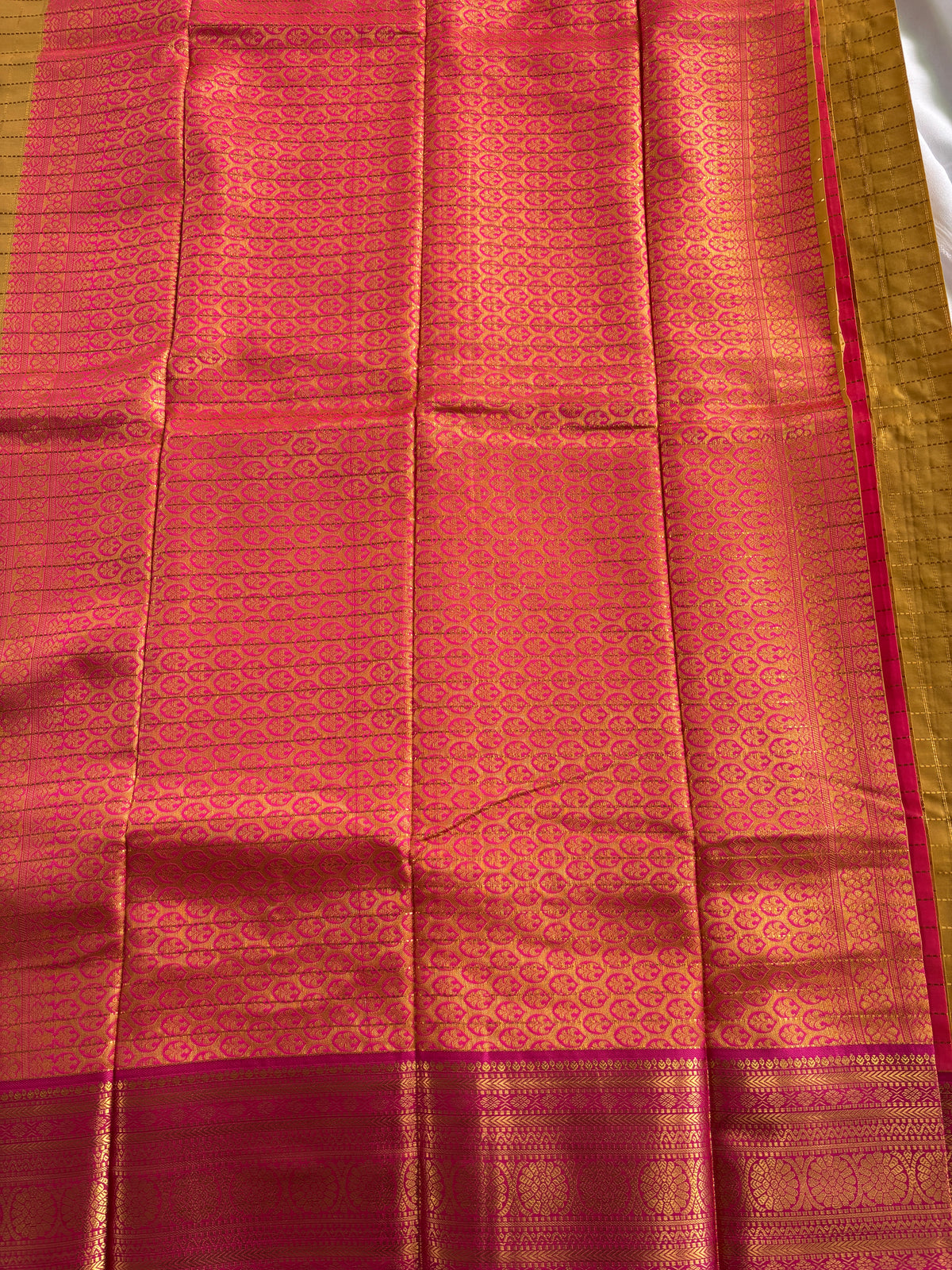 Kanchi silk Saree-with Gold Zari Stripes and Contrast Green Accents